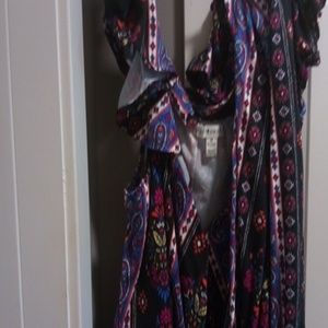 A floral black off-the-shoulder jumpsuit